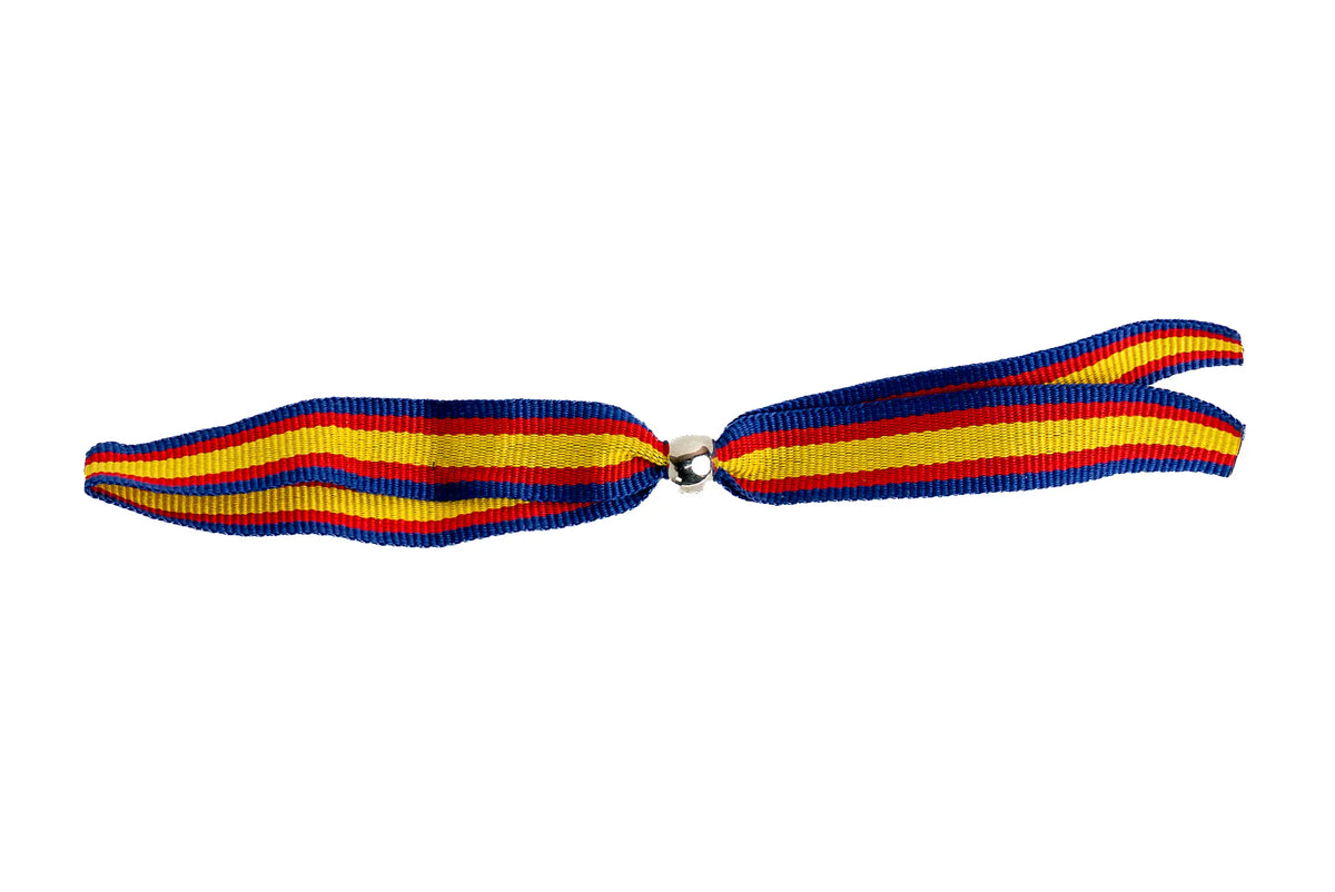 Comprar Pulsera de tela bandera de España con perfil azul con bola plateada · 1,5 cm La Flamenca de Borgoña Bandera España