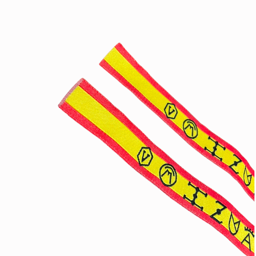 Pulsera de tela con hierros taurinos y bandera de España