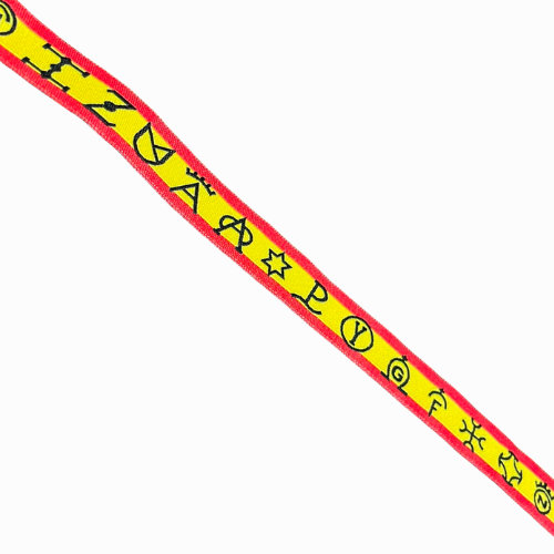 Pulsera de tela con hierros taurinos y bandera de España