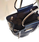 Comprar Bolso saco bombonera PIEL MARINO Bandera España La Flamenca de Borgoña Patricia Muñoz VOX